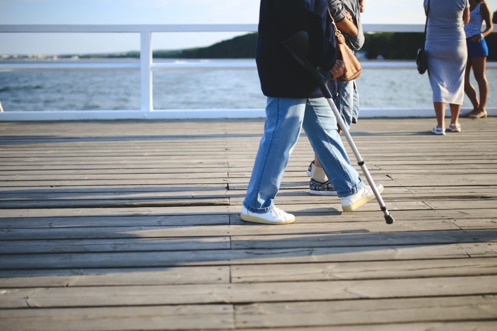 man walking with a cane